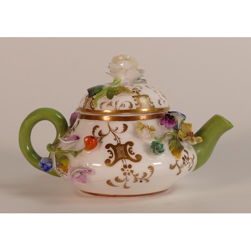 36 - Meissen, 19th century florally encrusted tea pot. a/f. Height: 6cm