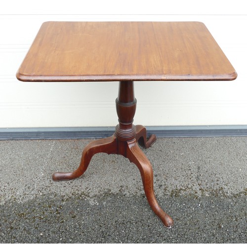 627 - Victorian Mahogany tilt top table with rectangular top. H 74cm. Size of top 55cm x 74cm