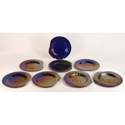 69 - Mendini Glass, a set of eight Purple Lustre plates. Moulded with abrasion to one edge. Diameter: 18c... 