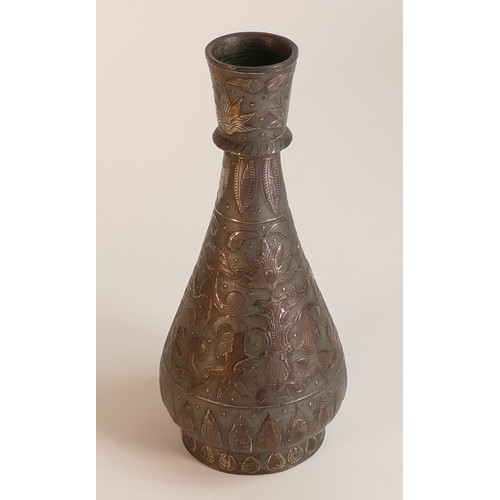 77 - 18th/19th century Indian Deccan Bidriware vase of teardrop form. Body is decorated with silvered sty... 