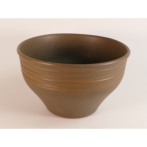 14 - Frank Brookes for Wedgwood, a studio stoneware pottery large footed bowl, brown glazed with banded t... 