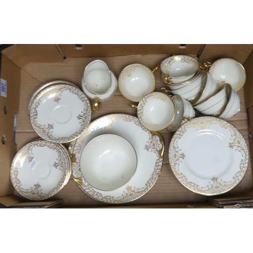 307 - Royal Doulton Cream And Gilt China Tea Set To Include Tea Cups, Saucers, Large Sugar Bowl, Milk jug ... 