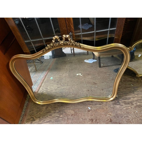 688 - Pair of Gilt Framed curved wall hanging French style Mirrors.
Largest - H75cmxW100cm approx