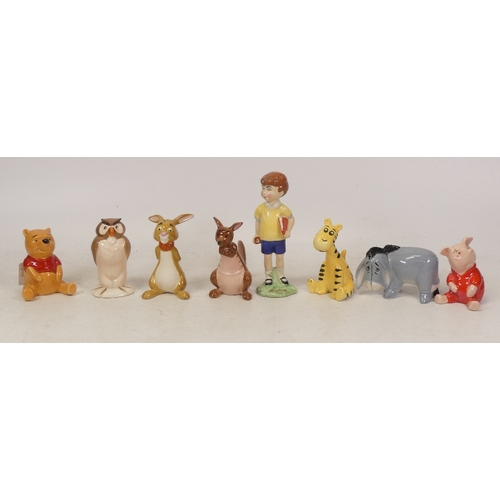 99 - Beswick Winnie The Pooh Set of Eight Figures Including Christopher Robin, Winnie The Pooh, Eeyore, R... 