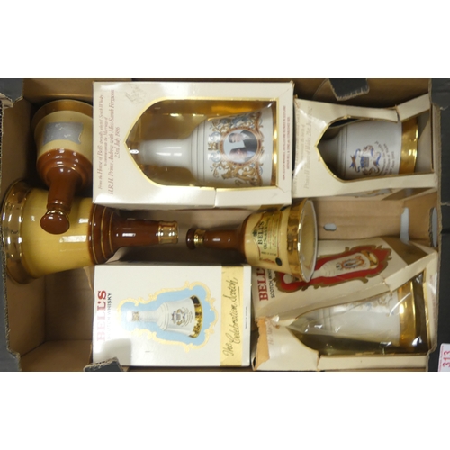 313 - Wade, A Collection of Empty Bells Decanters including some boxed (wear to boxes) (1 Tray)