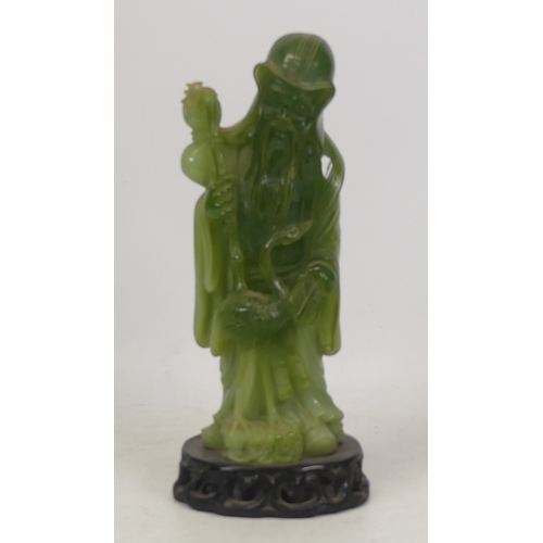 407 - Chinese Resin Faux Jade hand carved figure with a bird, on a base that is marked. (H:24cm)