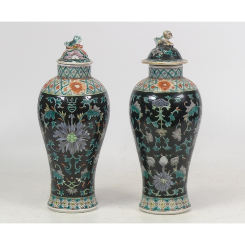 411 - Two Chinese Baluster Form Lidded Vases. a/f. (H:23.5cm) (2)