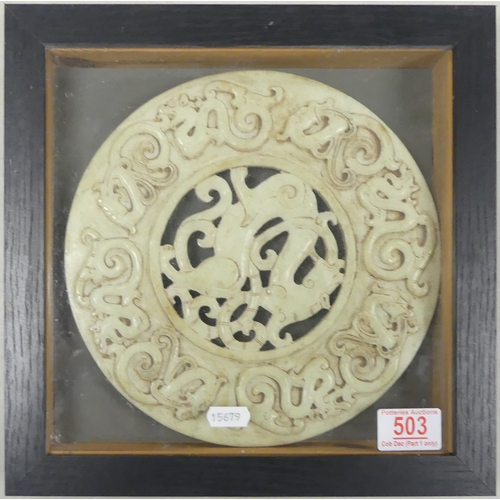 503 - Framed hand carved circular Soapstone plaque decorated with mythical beasts. (L:29cm x W;29cm)