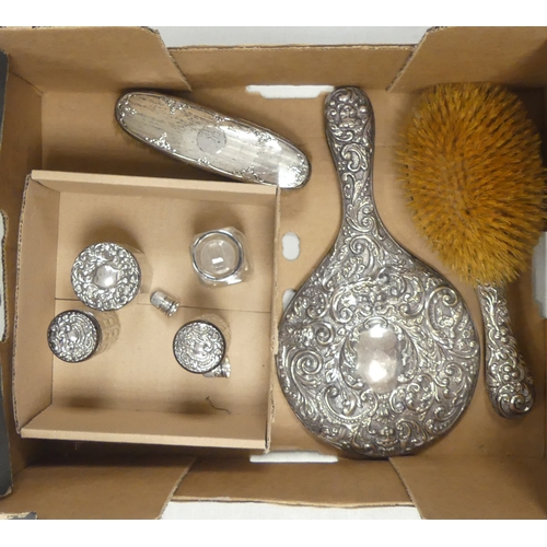 592 - Silver Vanity set to include mirror, comb, brush, Four Silver topped Jars and Thumbnail. a/f. (Small... 