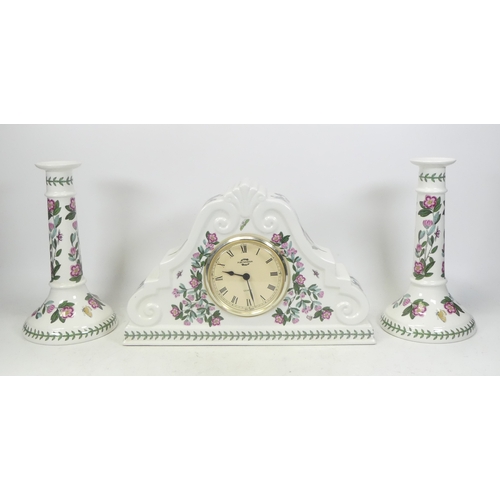 95 - Portmerion, Botanical Mantle Clock together with two Botanic Garden Candlesticks (seconds) (3)