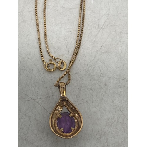 668 - 9ct Gold pendant with purple stone total weight 3.6g