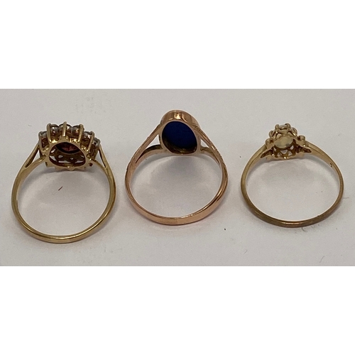 629 - Three 9ct gold ladies dress rings, each set with semi precious stones, sizes Q-R, 7g.