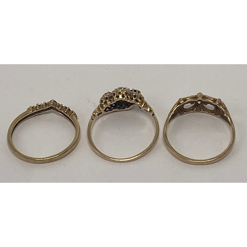 648 - Three 9ct gold ladies dress rings, each set with semi precious stones, 4.9g.