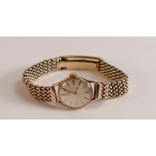 716 - 9ct gold ladies Omega wristwatch with 9ct gold bracelet, 31.4g, in original box.