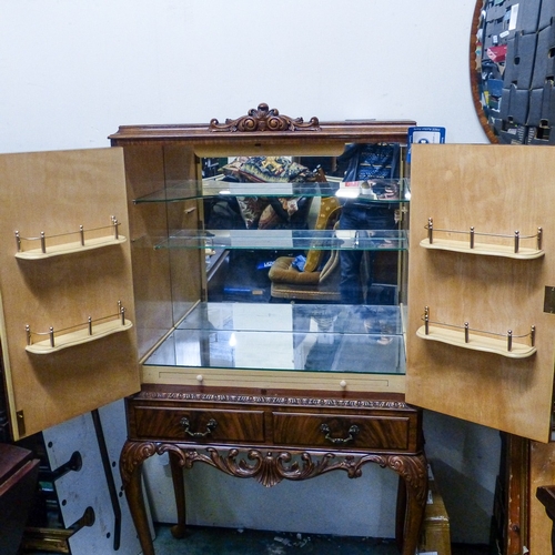 694 - Reproduction Burr Walnut Cocktail Cabinet on tall cabriole legs with mirrored interior.
Measures - H... 