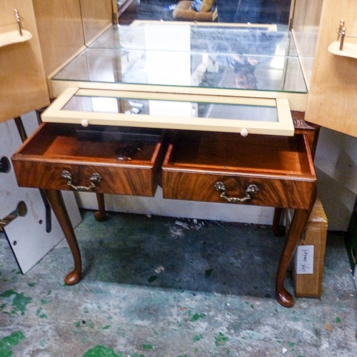 694 - Reproduction Burr Walnut Cocktail Cabinet on tall cabriole legs with mirrored interior.
Measures - H... 