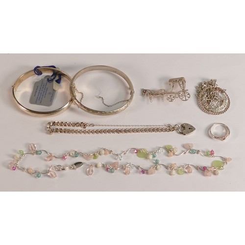 811 - A collection of Silver jewellery including two bangles, bracelet, pendant and chain, ring,etc 52.9g,... 