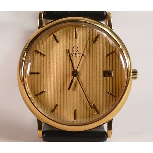 727 - Omega Deville gold plated quartz date wristwatch with gold dial, with brand new leather strap.