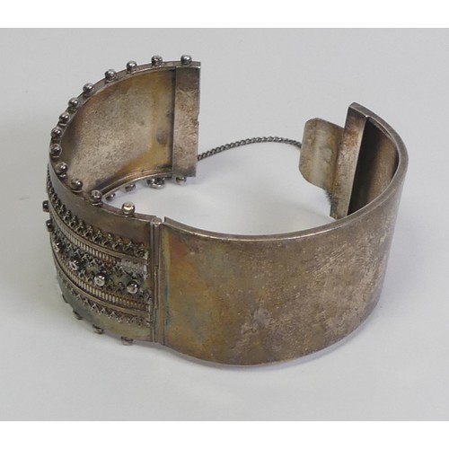 568 - Silver Cuff Hinged Bracelet With Safety Chain Decorated Front With Slight Damage Unmarked Silver But... 