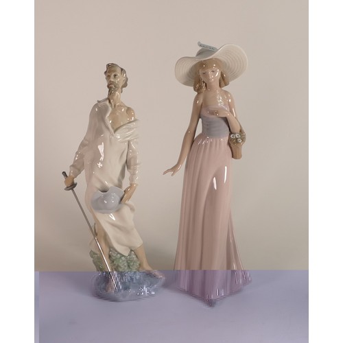 124 - Two Nao by Lladro Figures to include 'Don Quixote' holding a sword a/f No.390 and 'Girl with a Big H... 