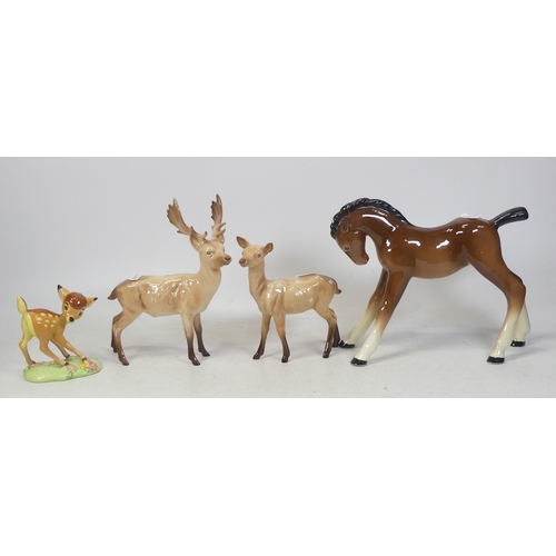 436 - Four Ceramic Horses, includes Large Sylvac Foal, Beswick Stag with Doe and a Disney Showcase figure ... 