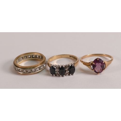 733 - 9ct gold eternity ring, and two 9ct gold stone set rings, 6.1g. (3)