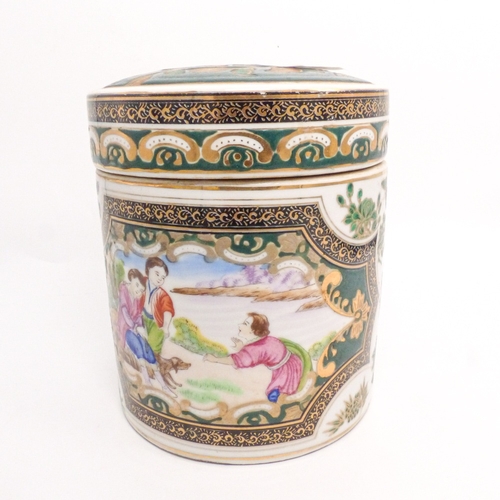 72 - 20th Century Chinese export porcelain tea caddie and cover decorated with Garden scenes, h.15cm.