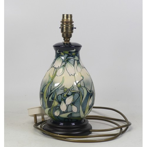 112B - A Moorcroft lamp base decorated in the Nivalis Snowdrop pattern. (H: 30cm)