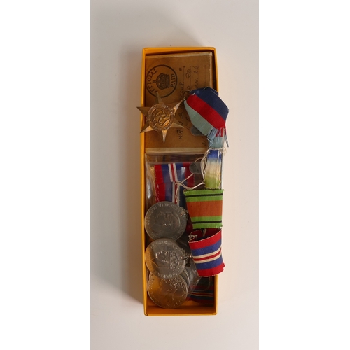 696 - WWII Medals: An assorted collection of medals, includes loose medals, Six 1939-45 War Medals and an ... 