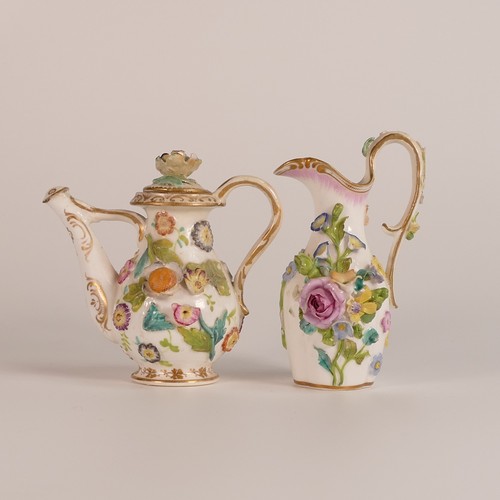 82 - Five 19th century florally encrusted porcelain items, including green tea pot with white floral and ... 