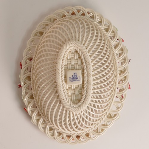 102 - Belleek, florally encrusted woven porcelain basket. Bears the 8th 'Belleek' Blue mark used from 1993... 