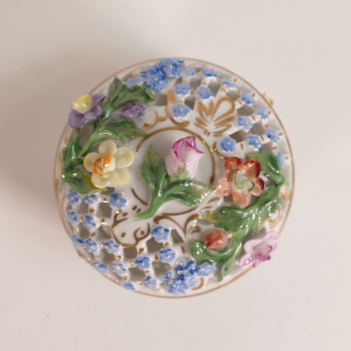 112 - Carl Thieme, encrusted porcelain lidded box of reticulated form. Underglaze blue printed marks to ba... 