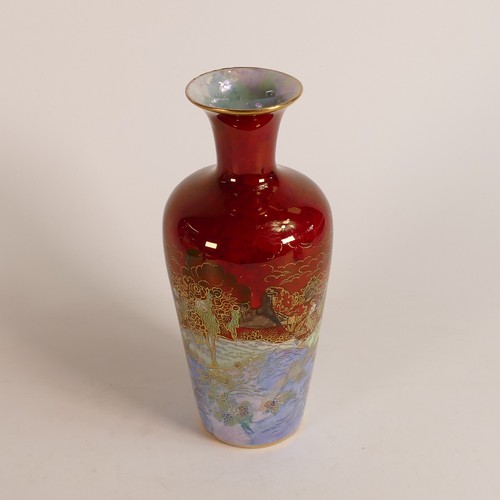 113 - A. G. Harley Jones, Wilton Ware Oriental pattern red lustre fairyland baluster vase. Height: 20.5cm