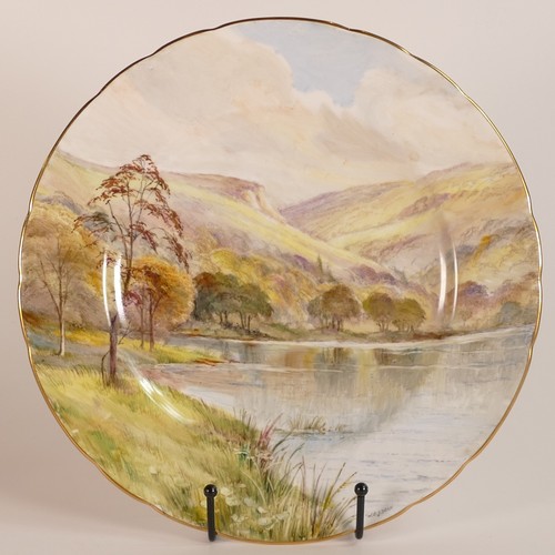 129 - W. E. J. Dean for Royal Crown Derby, three hand painted titled landscape plates. Diameter: 26.5cm (3... 