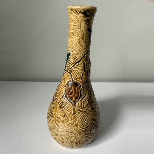 147 - Martin Brothers Gourd vase, decorated in two tone brown leaf & berries decoration on incised straw g... 