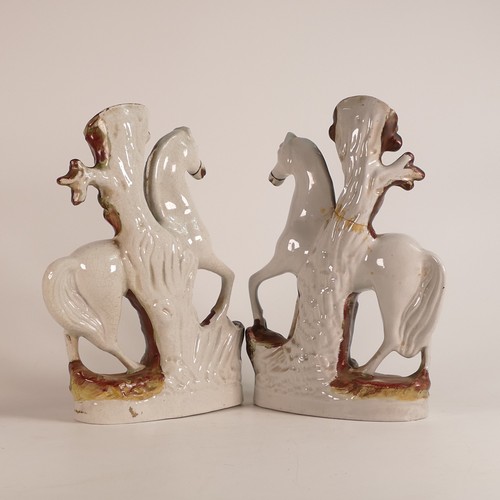 165 - Factory of Thomas Parr, near pair of mid-Victorian spill vases, modelled as two white horses on a na... 