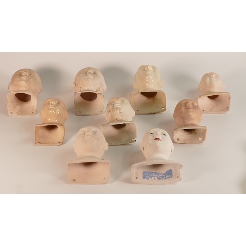 189 - Isabella Pope, nine Studio Pottery cushion doll heads. Pope was a Master Potter and teacher who crea... 