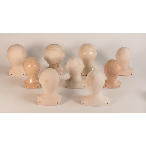 189 - Isabella Pope, nine Studio Pottery cushion doll heads. Pope was a Master Potter and teacher who crea... 