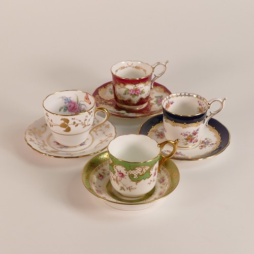 211 - Three Coalport floral coffee cups and saucers together with lone saucer and one Copeland Spode examp... 