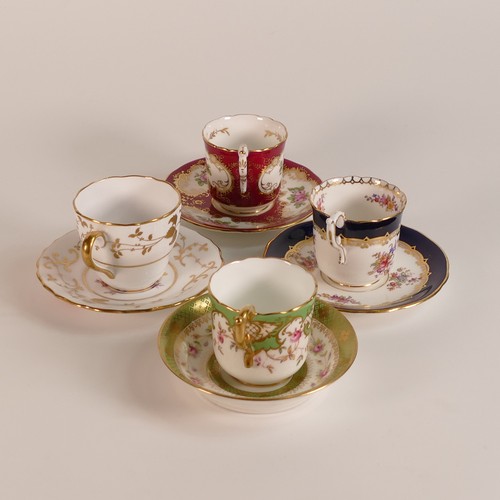 211 - Three Coalport floral coffee cups and saucers together with lone saucer and one Copeland Spode examp... 