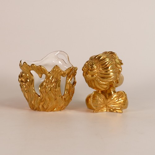 217 - Minton, Cherub collection tea light and pepper. Heavily gilt decoration. (2)