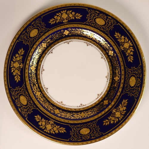 223 - Minton, five heavily gilt plates and bowls, includes Porcelain Ball pattern bowl, Atholl pattern blu... 