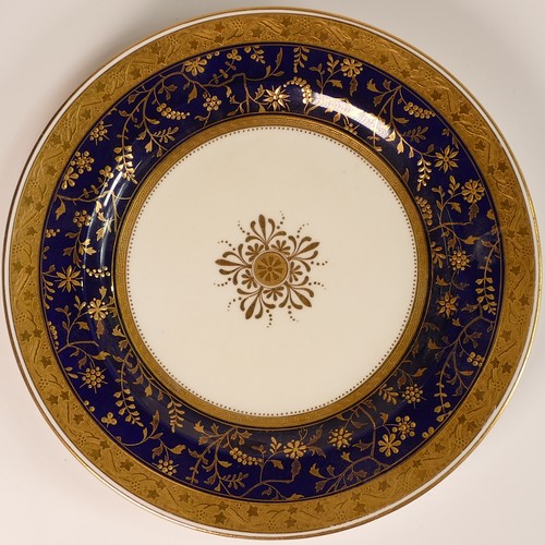 223 - Minton, five heavily gilt plates and bowls, includes Porcelain Ball pattern bowl, Atholl pattern blu... 