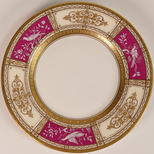 231 - Minton, five Pate-sur-Pate side plates. Heavily gilt with red ground panels with painted bird scenes... 