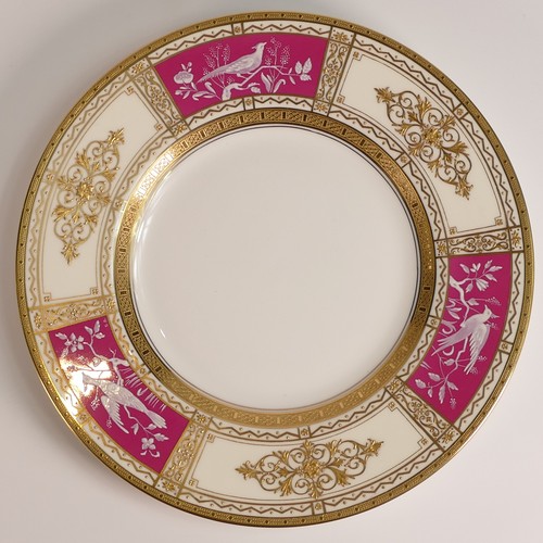 232 - Minton, two Pate-sur-Pate small plates. Heavily gilt with red ground panels with painted bird scenes... 