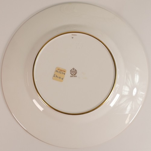 235 - Minton, two heavily gilt dinner plates. Heavily gilt with cream and yellow ground panels with elabor... 