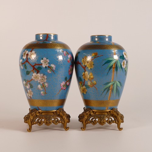 257 - Attributed to Minton, pair of Aesthetic Movement Celeste Blue ground Blue Tit vases on fitted Ormolu... 