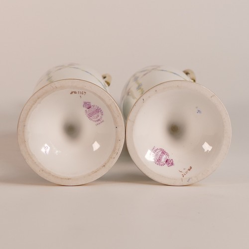 260 - Minton, pair of hand painted twin handled vase and covers. Painted with rose swags on white. Cobalt ... 