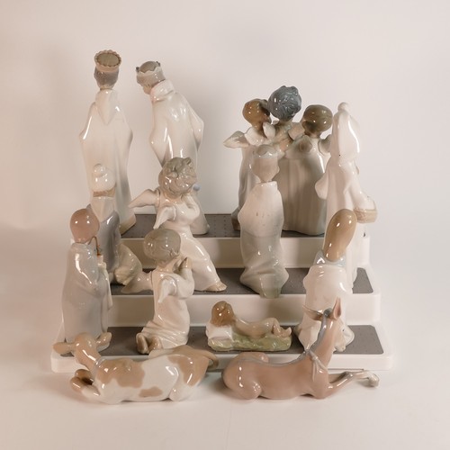 261 - Lladro, thirteen figures including Nativity Scene and related examples. (13)