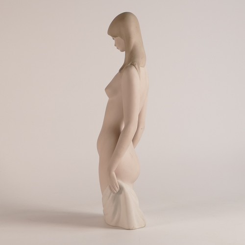 263 - Lladro Nude figure of lady, height 32cm.